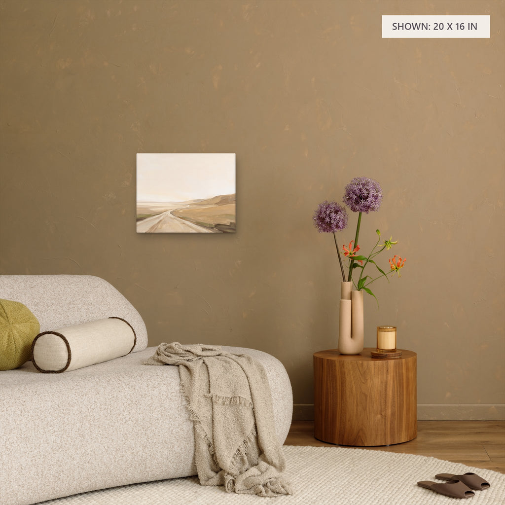 Rolling Fields Under a Pale Sky canvas, 20 x 16 in, above a side table; room setting for illustration