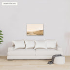 Rolling Fields Under a Pale Sky canvas, 36 x 24 in, above a sofa; room setting for illustration