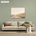Rolling Fields Under a Pale Sky canvas, 40 x 30 in, above a sofa; room setting for illustration